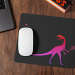 Dinosaur tennis mouse pad on desk