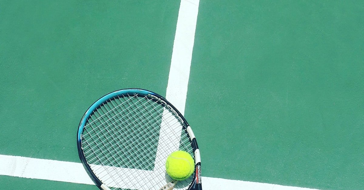 Tennis racket and ball on a tennis court, ideal Father's Day tennis gift backdrop